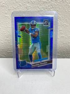 lot 50C image: 2023 Panini Donruss Optic Hendon Hooker Blue Hyper Prizm Rated Rookie #234 J