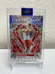 lot 49 image: 2023 Panini Donruss Optic Travis Kelce Diamond Hands Silver Prizm #DH-TK J