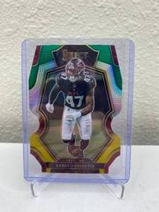 lot 926 image: 2022 Panini Select Arnold Ebiketie Premier Level Green and Yellow Prizm Die-Cut RC #106 J