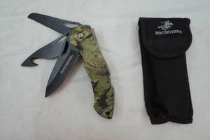 lot 31 image: Winchester folding knife with tools