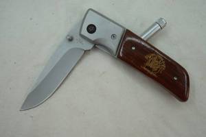 lot 35 image: 4 pocket knife with light