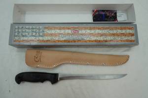lot 36 image: Fillet knife with leather sheath
