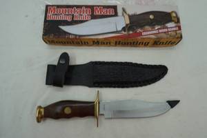 lot 100 image: Mountain Man fixed blade knife, 5 34 stainless steel blade
