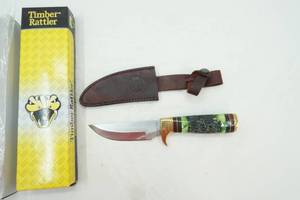 lot 128 image: Timber Rattler fixed blade knife with brass and ornate hilt