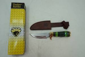 lot 130 image: Timber Rattler fixed blade knife with brass and ornate hilt