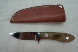 lot 149 image: Sarge knife with leather sheath and belt loop