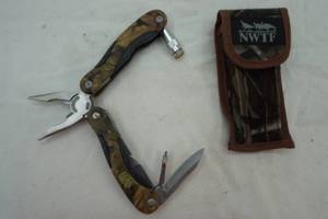 lot 181 image: Stainless multi tool in NWTF sheath