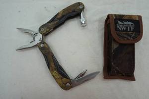 lot 183 image: Stainless multi tool in NWTF sheath