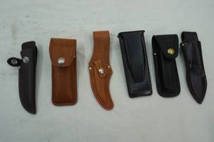 lot 209 image: 6ct knife sheaths. 5 leather 1 poly