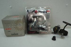 lot 223 image: 3 fishing reels-2 New in package