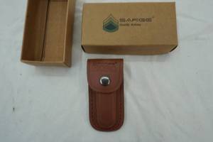 lot 16 image: Sarge SK Hobo Stainless Steel folding blade and folding fork, with leather sheath