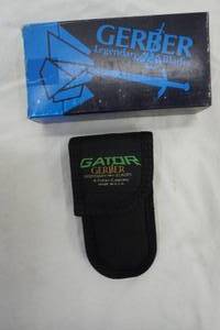 lot 19 image: Gerber 3folding blade and sheath