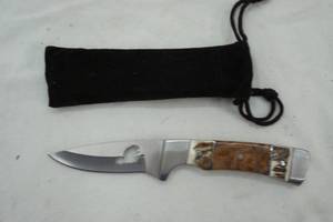 lot 22 image: 3 stainless fixed blade ornate hilt