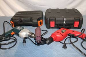 lot 14 image: Set of Corded and Cordless Drills with Cases