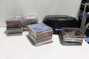 lot 42 image: Sony CD Radio Cassette Player with 24 CD Collection
