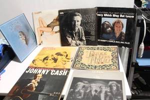 lot 55 image: Collection of 9 Classic Vinyl Records Featuring Iconic Artists