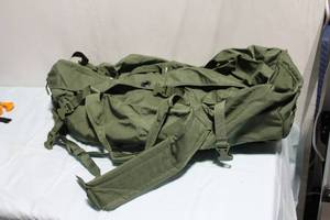 lot 146 image: Olive Green Military-Style Rucksack