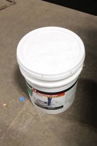 lot 162 image: 50 lb Bucket of Traction Grit