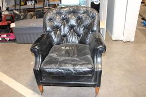 lot 178 image: Black Leather Armchair with Tufted Design