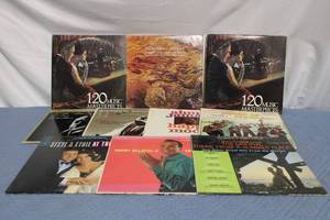lot 196 image: Collection of Vintage Vinyl Records Featuring Classical, Jazz, and Calypso Music