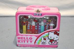 lot 423 image: Hello Kitty PEZ Collectible Dispenser Set with Tin Box
