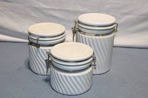 lot 441 image: Set of 3 White Ribbed Ceramic Canisters with Clamp Lids