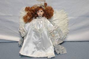 lot 449 image: Porcelain Angel Doll with Red Curls and White Feather Wings