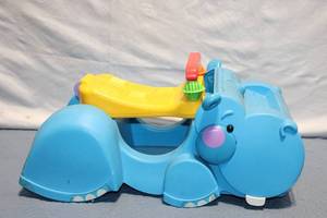 lot 456 image: Fisher-Price Hippo Ride-On Toy for Toddlers