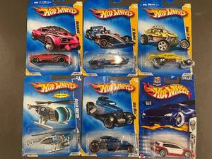 A - Lot of 8 Hot Wheels Cars and Helicopter Collection