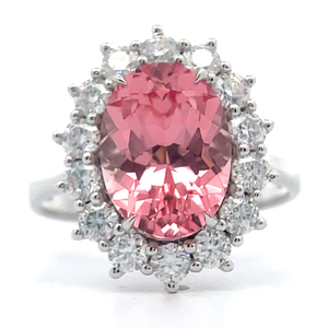 lot 16 image: Oval Padparadscha Sapphire & Diamond Halo Cluster Ring in 14k White Gold VIDEO