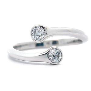 lot 49 image: NEW 0.30 Carat Diamond Two-Stone Bezel Coiled Bypass Ring