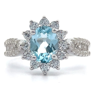 lot 55 image: Oval Blue Topaz & PavWhite Topaz Flower Ring VIDEO