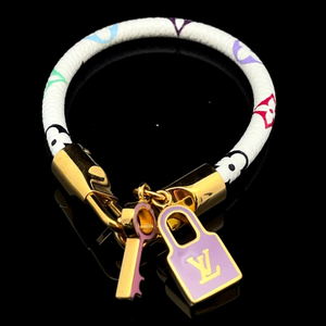 lot 31A image: Louis Vuitton Multicolor Lock & Key Bracelet in White Canvas and Gold-Tone Hardware VIDEO
