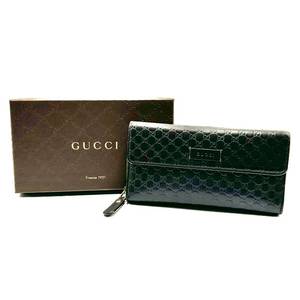 lot 43A image: Gucci Dark Brown Micro Guccisima Leather Round Zip Long Wallet w Box Pre-Owned Retail $750
