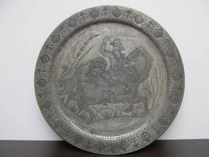 lot 138 image: Interesting Signed Antique Middle Eastern Chased Metal Round Frieze - Man on Horseback being Attacked by Lion