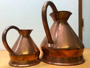 lot 296 image: 2 Quality Vintage PEERAGE Copper Measure Jugs