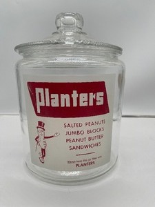 lot 67 image: 1950s Planters Mr. Peanut Counter Apothecary Jar wLid