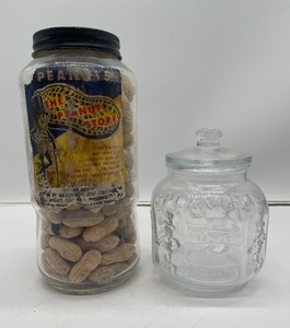 lot 81 image: Vintage Planters LOT - The Peanut Store Jar and Five Cent Glass Jar