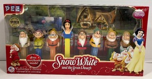 lot 56 image: Snow White And The Seven Dwarfs PEZ Dispensers New in Box