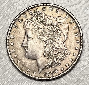 lot 60 image: 1889 Morgan Silver Dollar