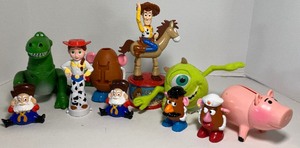 lot 65 image: Lot of Nine Vintage Toy Story Toys Figures