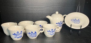 lot 98 image: Vintage 8 Pieces Set of  Childrens Tea Set - Dutch Boy and Girl - Edwin M. Knowles China