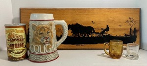 lot 122 image: Hubbell House Beer Can, Cougar Beer Stein, Shot glasses and Wooden Horse Theme Decor