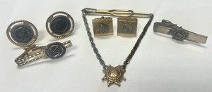 lot 171 image: Vintage Prudential Insurance Co. 14K Balfour Cuff Links, 1964-65 Worlds Fair Cufflink and Tie Clip Set