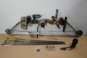 lot 3 image: PSE The Beast RH Compound Bow with Accessories