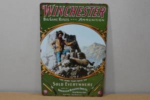 lot 83 image: Novelty Metal Sign -Winchester