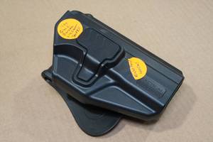 lot 132 image: Tactical Right Handed 40 Cal Holster