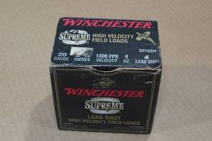 lot 198 image: 23 Winchester Supreme 20 Gauge 2-34 Lead 4 Shot Shotshells
