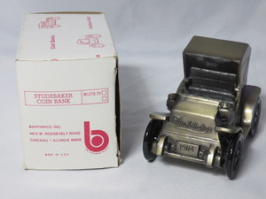 lot 8 image: 1904 Studebaker Coin Bank in box...