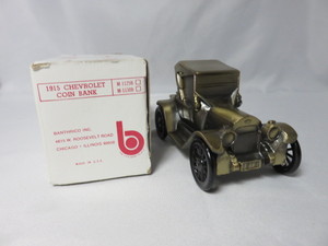 lot 9 image: 1915 Chevy Coin Bank in box...